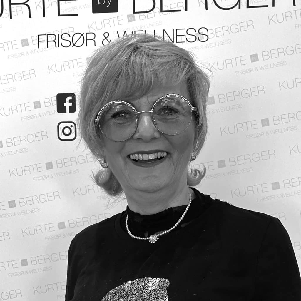 A portret photo of hairdresser Linda in black and white